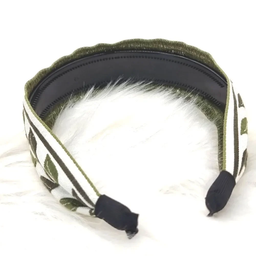 Embroidered green leaf headband